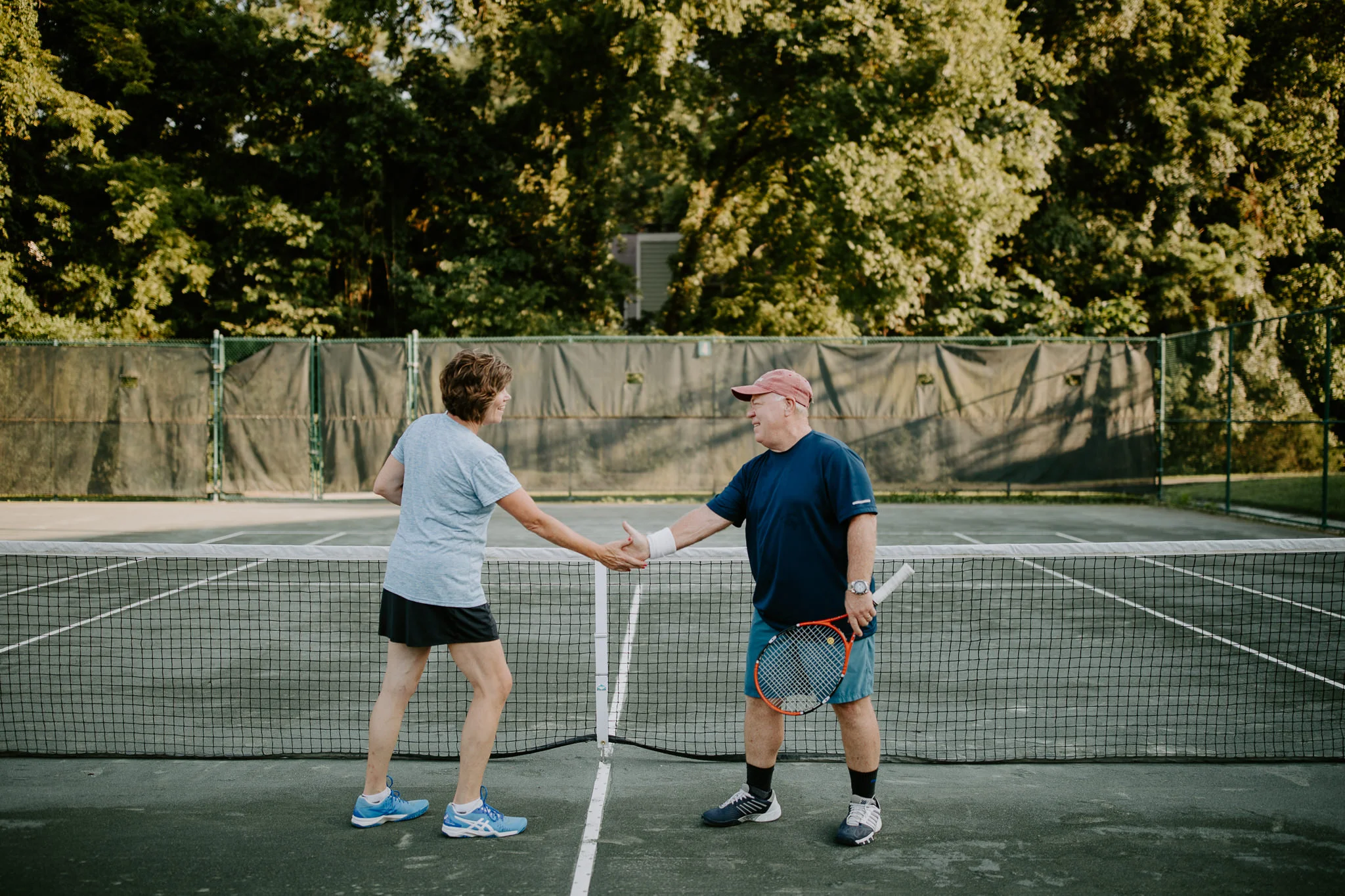 My parents classic high five after winning a point.
