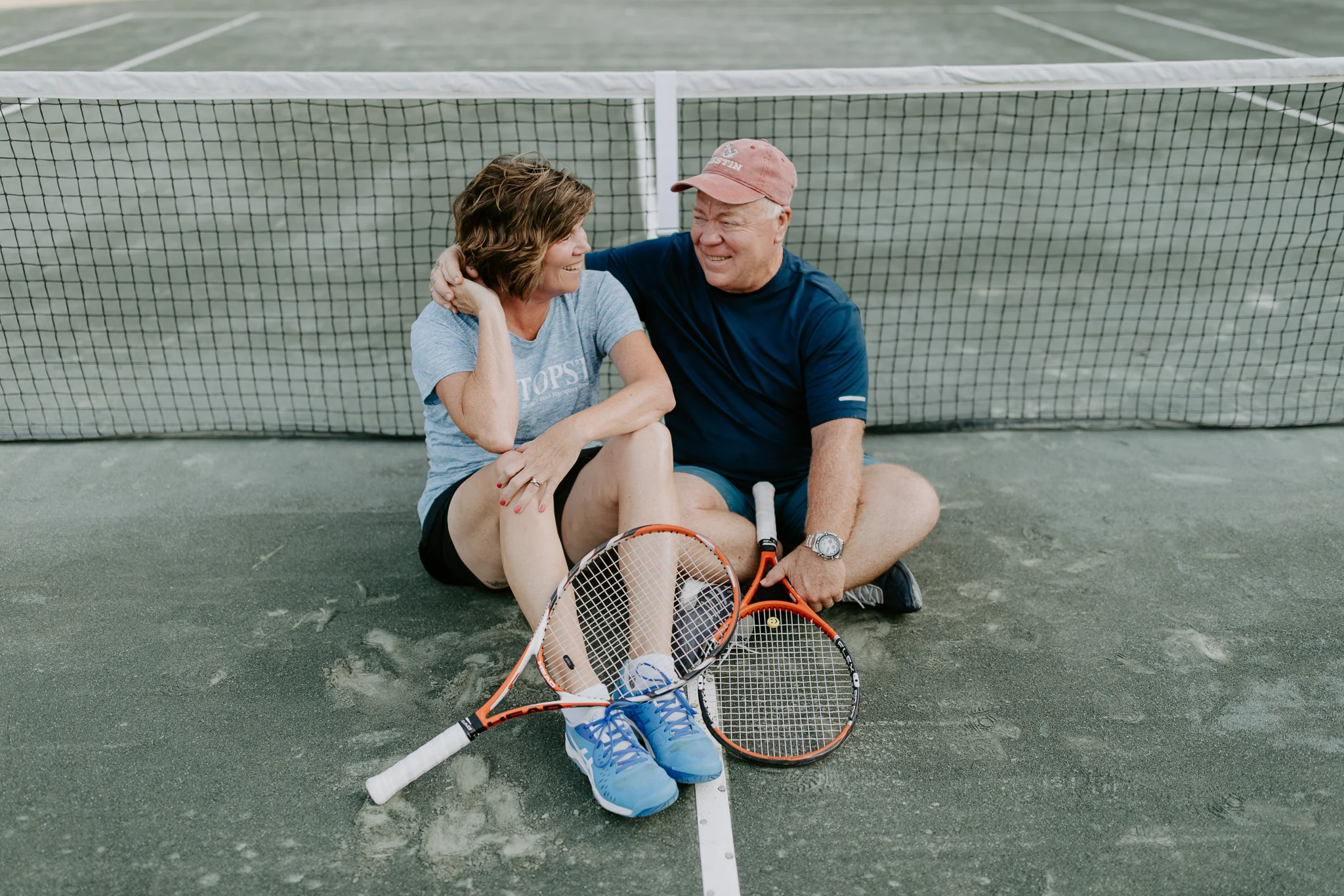 Couples Session with older couple on tennis courts