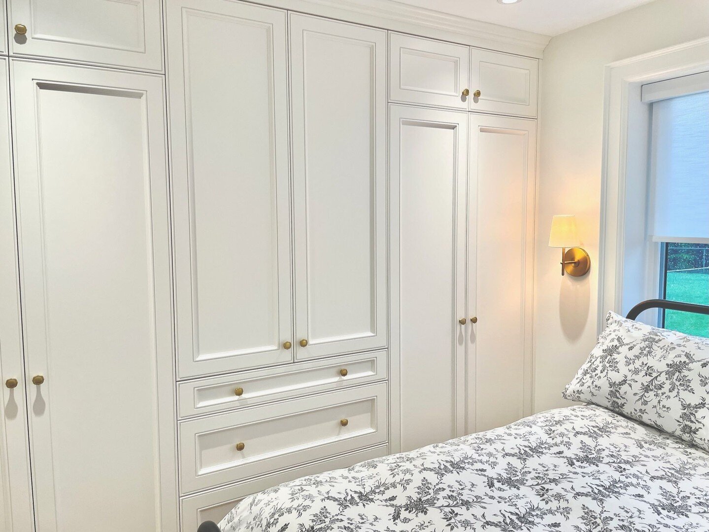 When it comes to maximizing storage in a small bedroom, built-in units are a fantastic solution. Not only do they provide ample storage space, but they also help in utilizing every inch of the room effectively!  We didn't have room for end tables so 