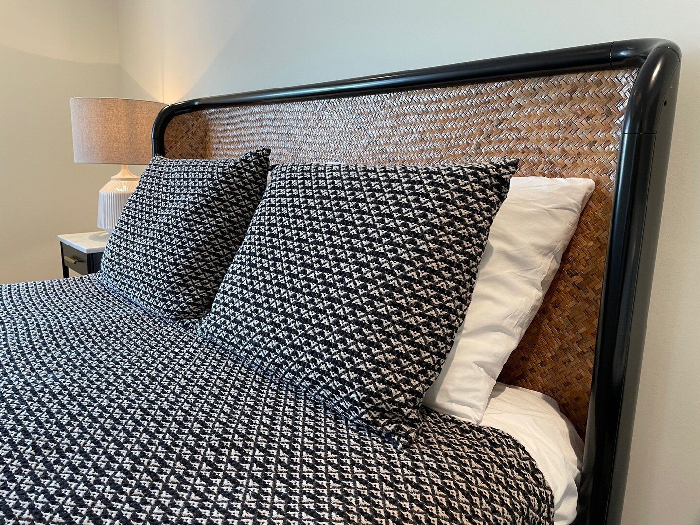 In love with this glossy black natural rattan bed from @cb2 . Paired with this raised black and beige graphic pattern duvet 😍 
.
.
.
.
.
.
.
.
.
.
.
.
.
#interiordesigner #interiordesignideas #homedecor #homestyling #interiordesign #decor
