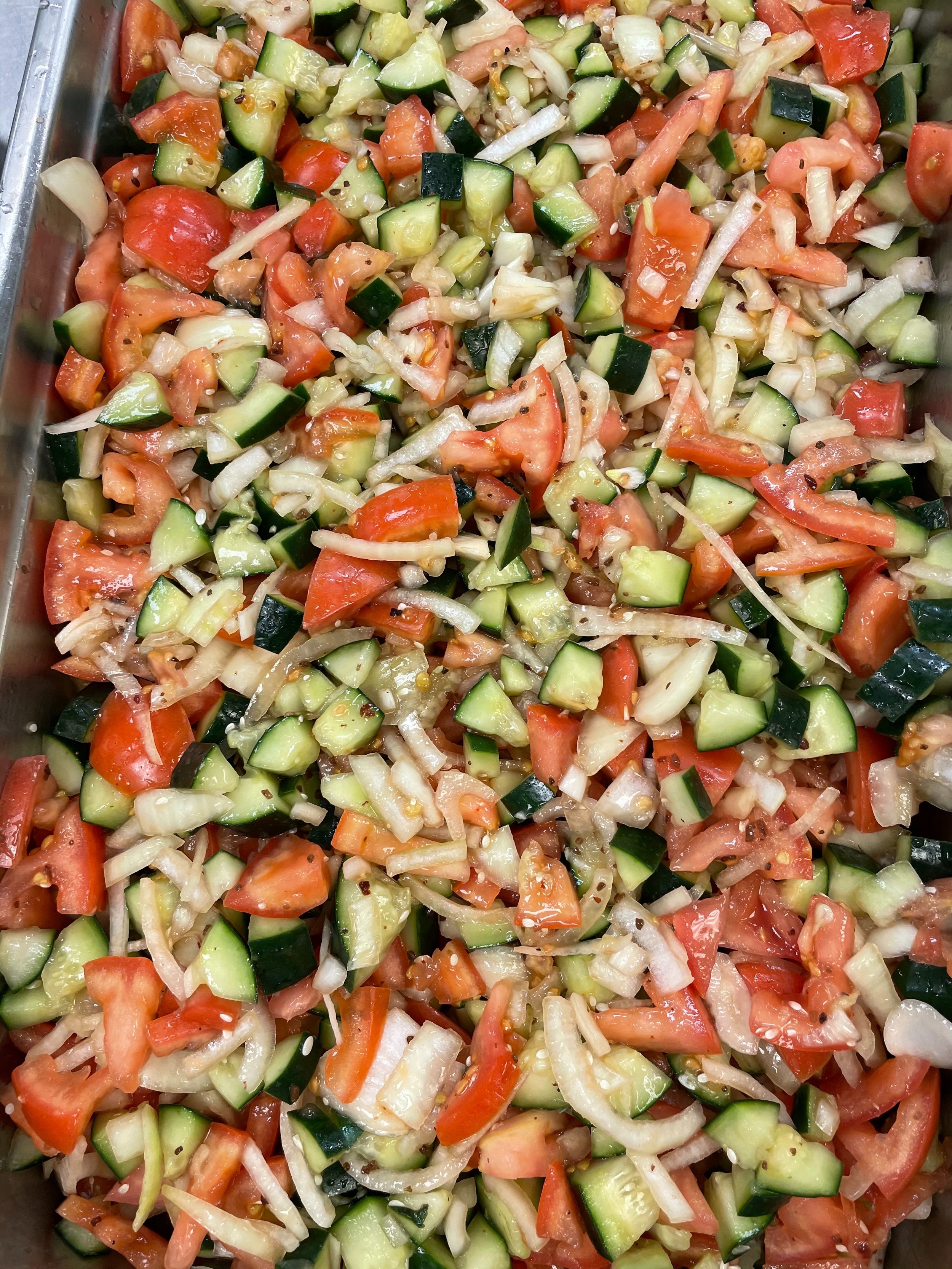 Summer salad featuring zucchini and tomatoes from mercy gardens.jpg