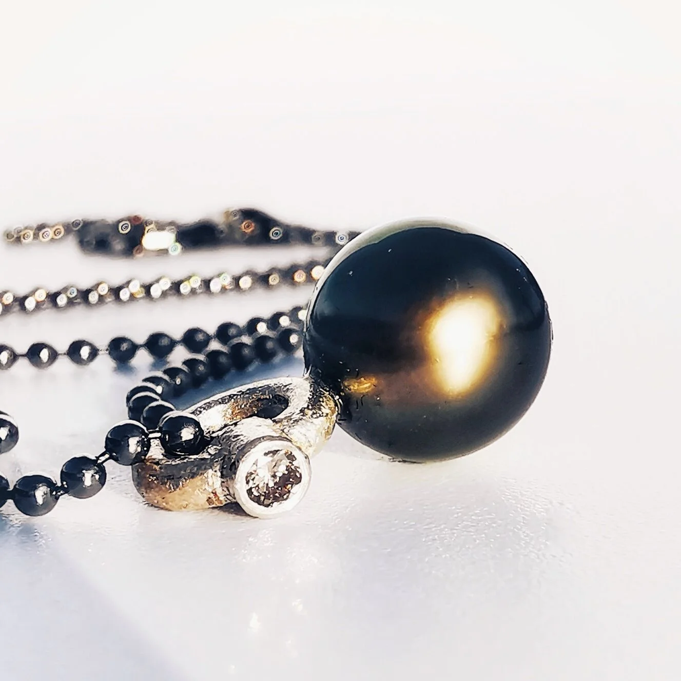 TAHITIPERLE VEDHÆNG I SØLV MED CHAMPAGNEFARVET DIAMANT