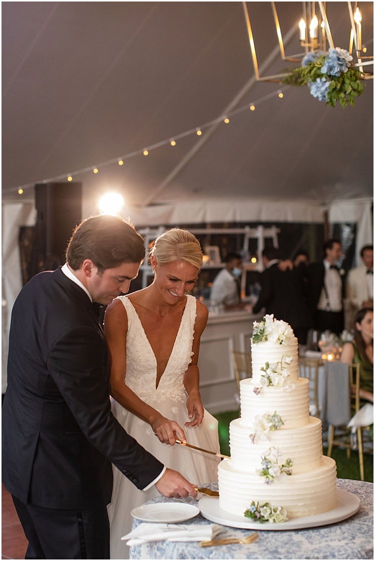 black tie wedding cake cutting