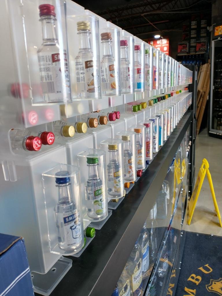 Commercial retail display for 50mL mini liquor bottle