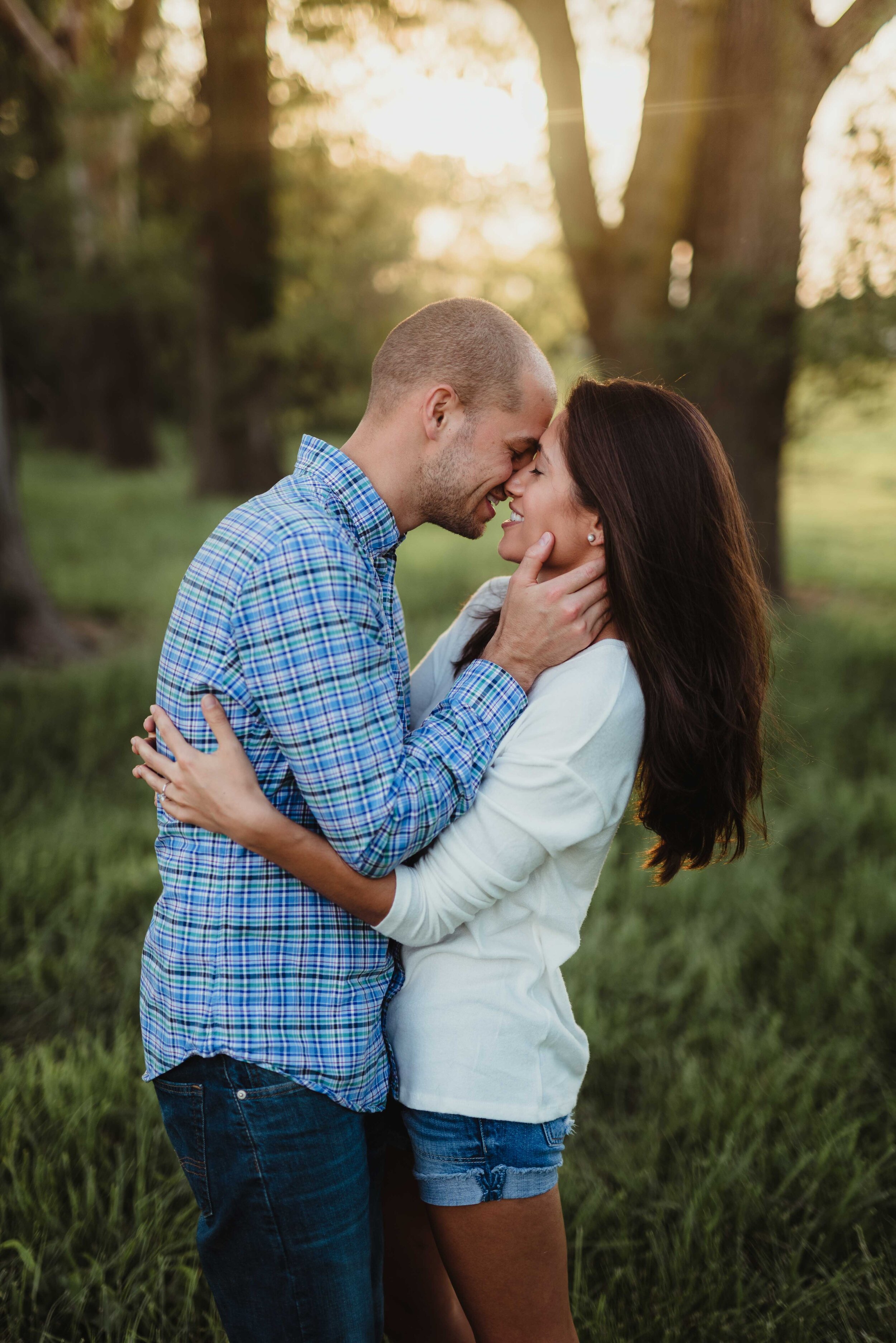 The almost kiss during their engagement session in Lafayette, Indiana. Kelly McPhail Photography is a premier engagement and wedding photographer NW Indiana.