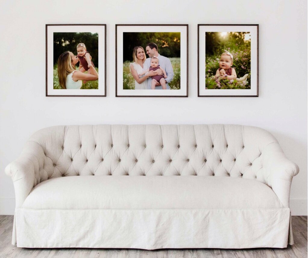 Prints displayed over a couch from a summer family session in session in West Lafayette, Indiana