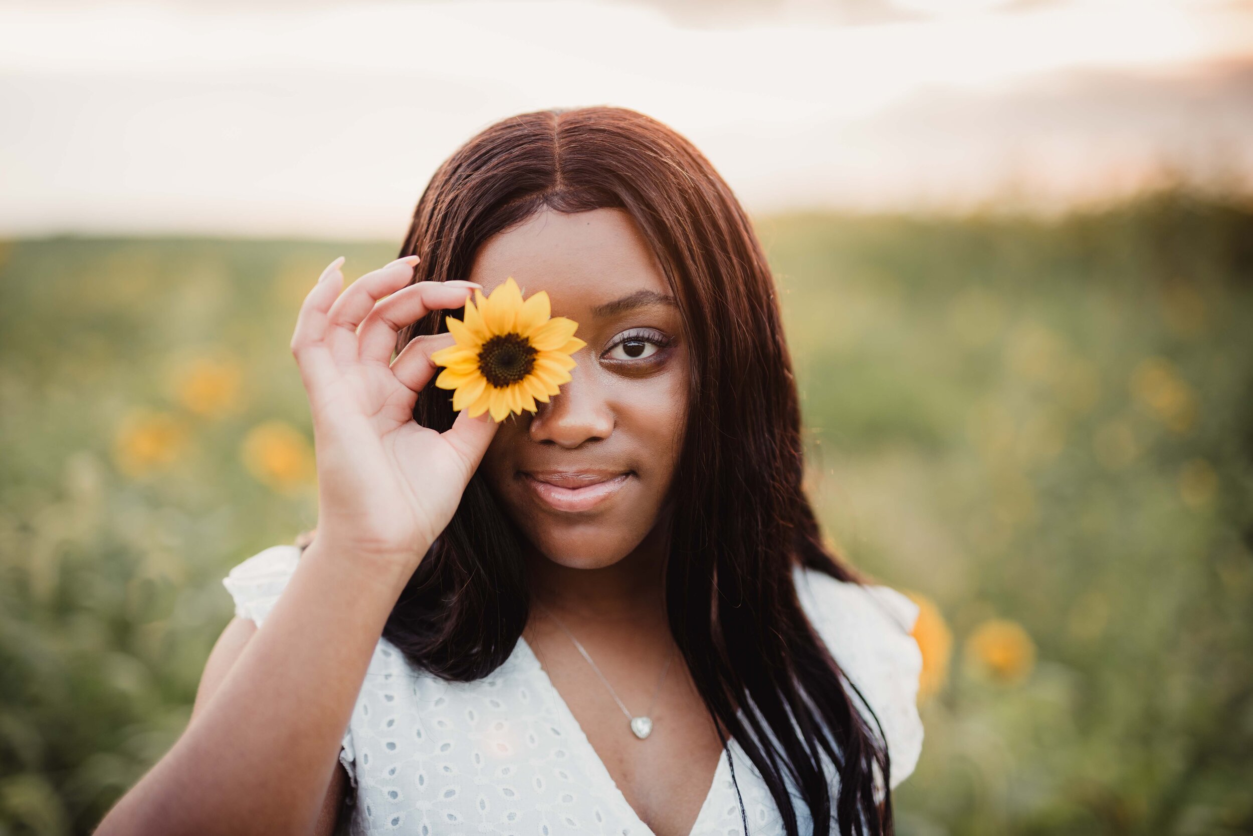 sunflower senior portrait pictures at Wea Creek Orchard in Lafayette Indiana