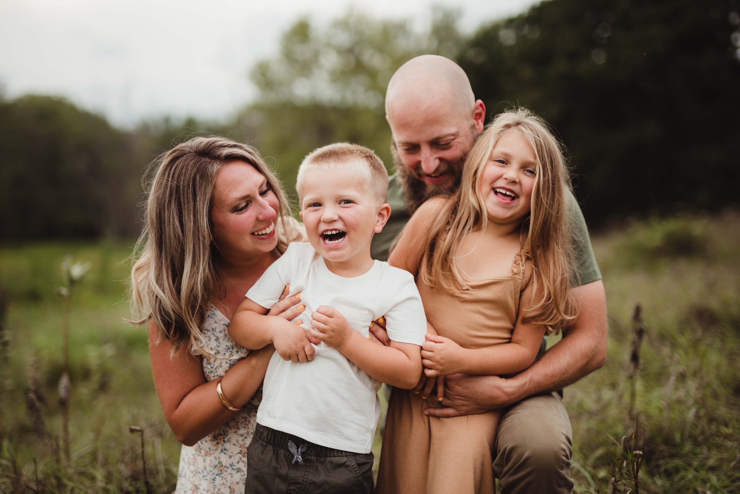 lifestyle family photographer in Lafayette, IN specializing in those candid laughter filled moments.