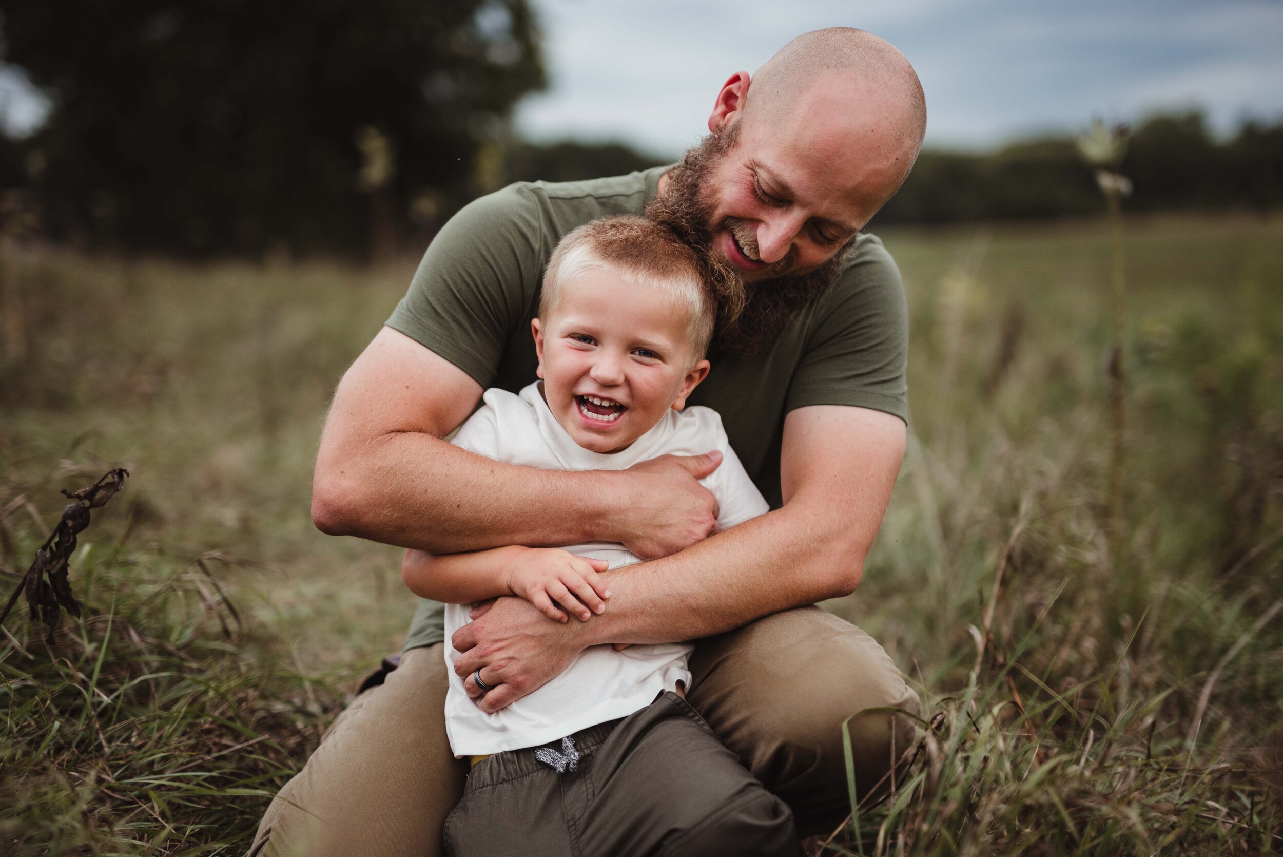 dad and son moment in West Lafayette, IN at family photo session