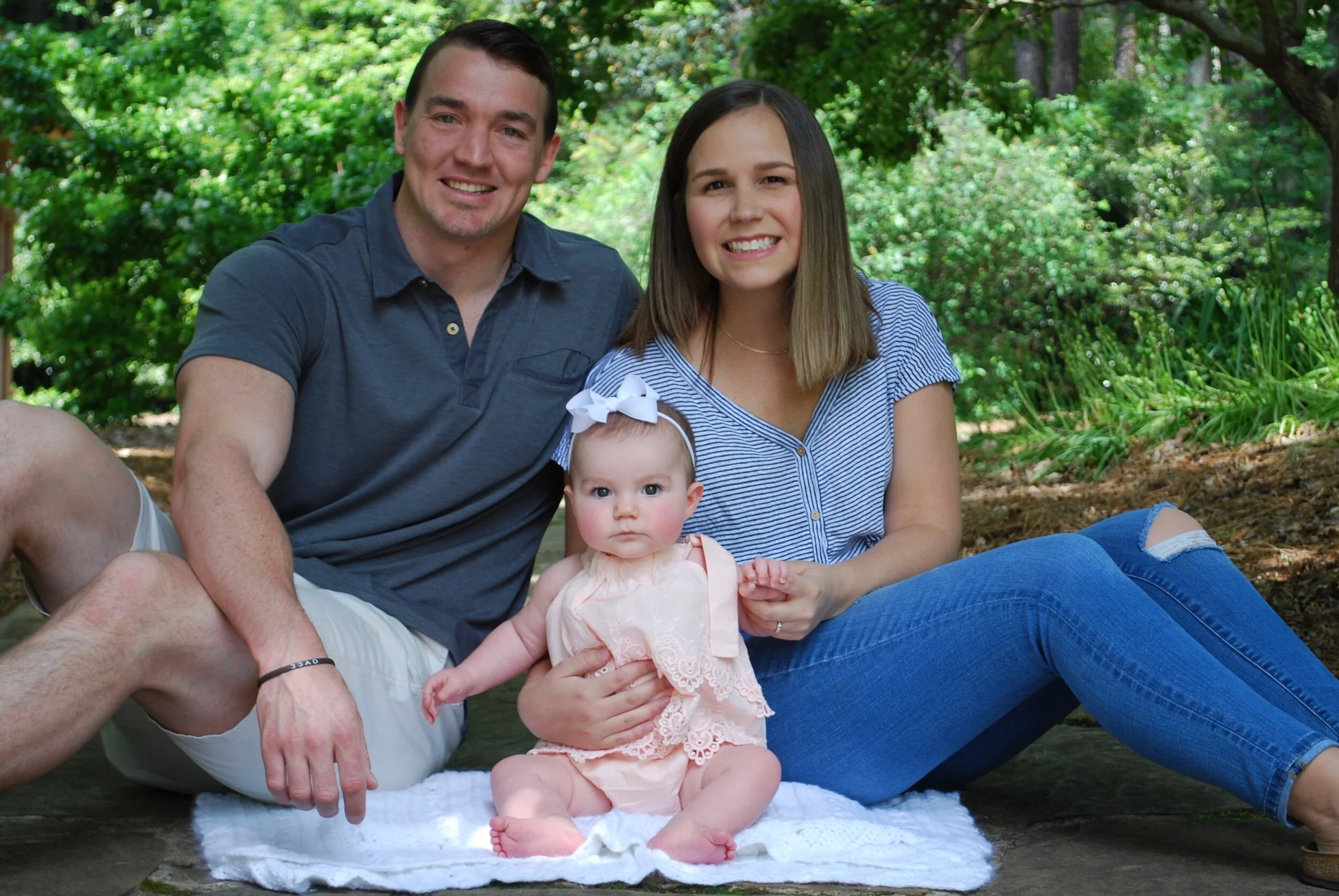 Lauren with her husband, Kameron, and daughter, Ellison.