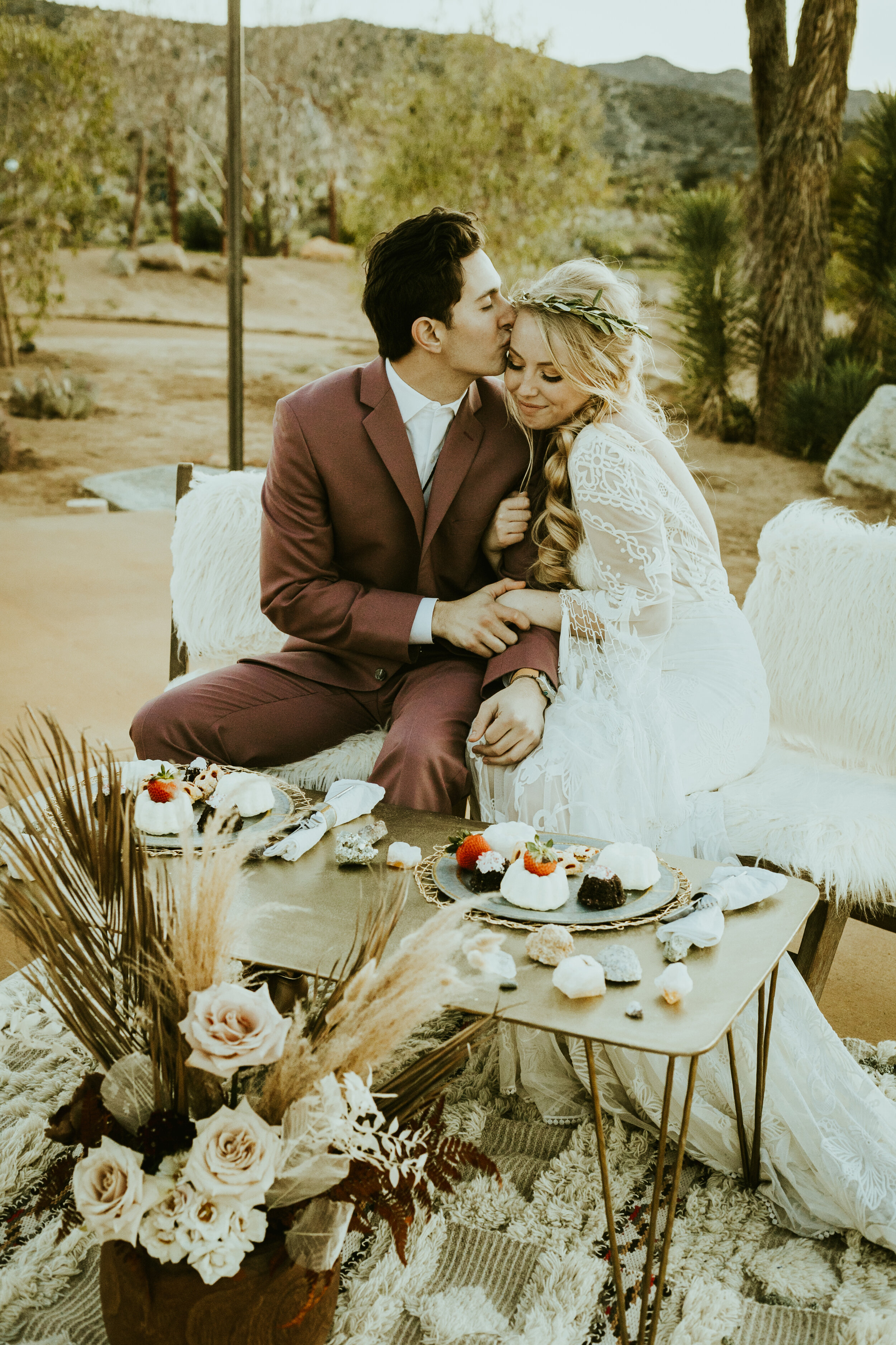 tumbleweed sanctuary joshua tree california wedding styled shoot boho wedding boho bride and groom trailer bar purple groom suit friar tux suit  boho wedding dress tassles wedding dress sleeves-1.jpg