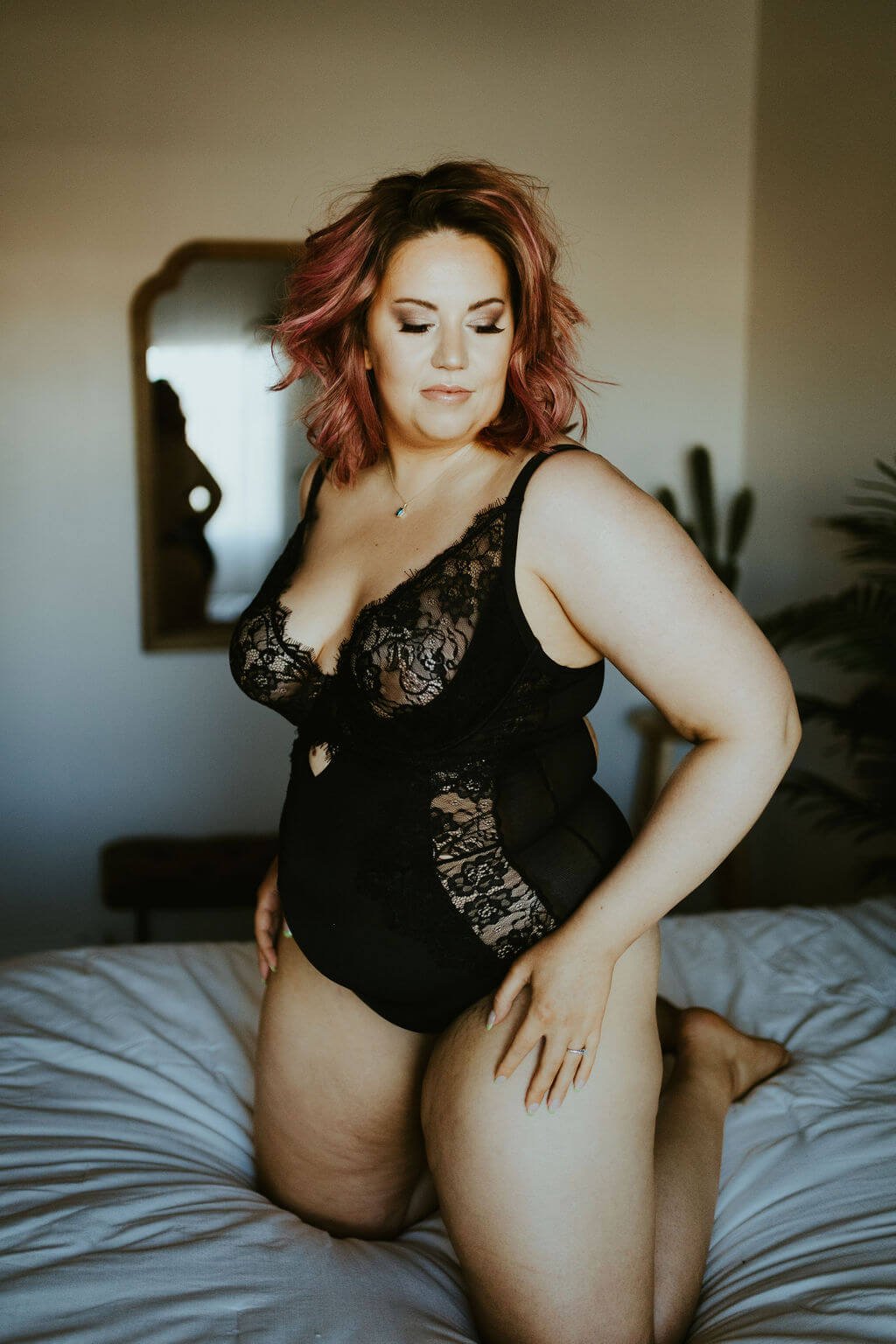 Woman in black lingerie Valentine's Day boudoir photoshoot