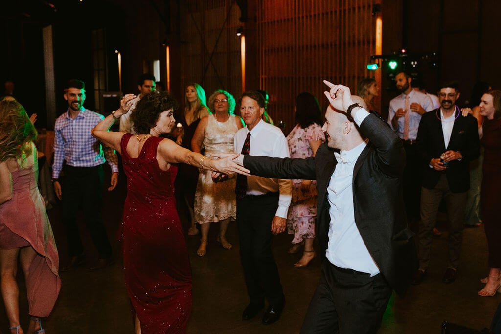 Groom dances with his mother at Arizona desert wedding reception