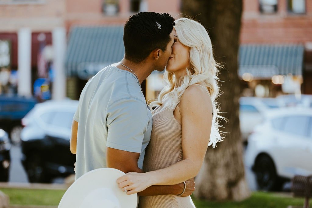 Couple kissing during Arizona engagement photos in Prescott
