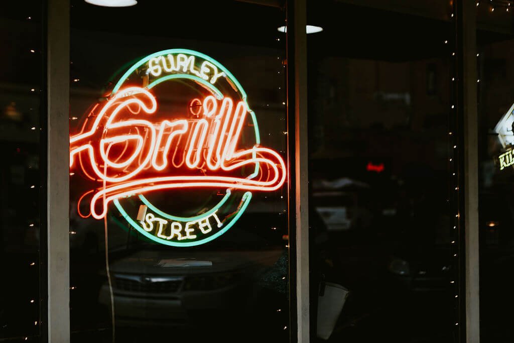 Image of neon Gurley Street Grill restaurant sign