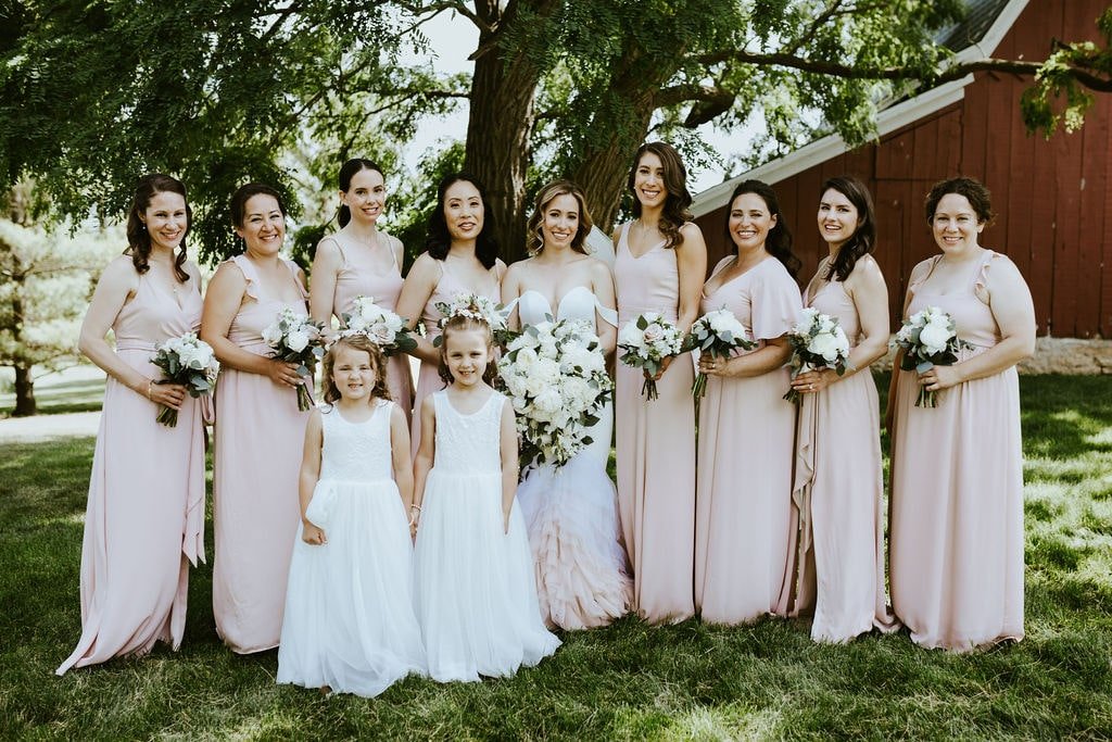 Bridal party in dusty rose bridesmaid dresses at Orchard Ridge Farms