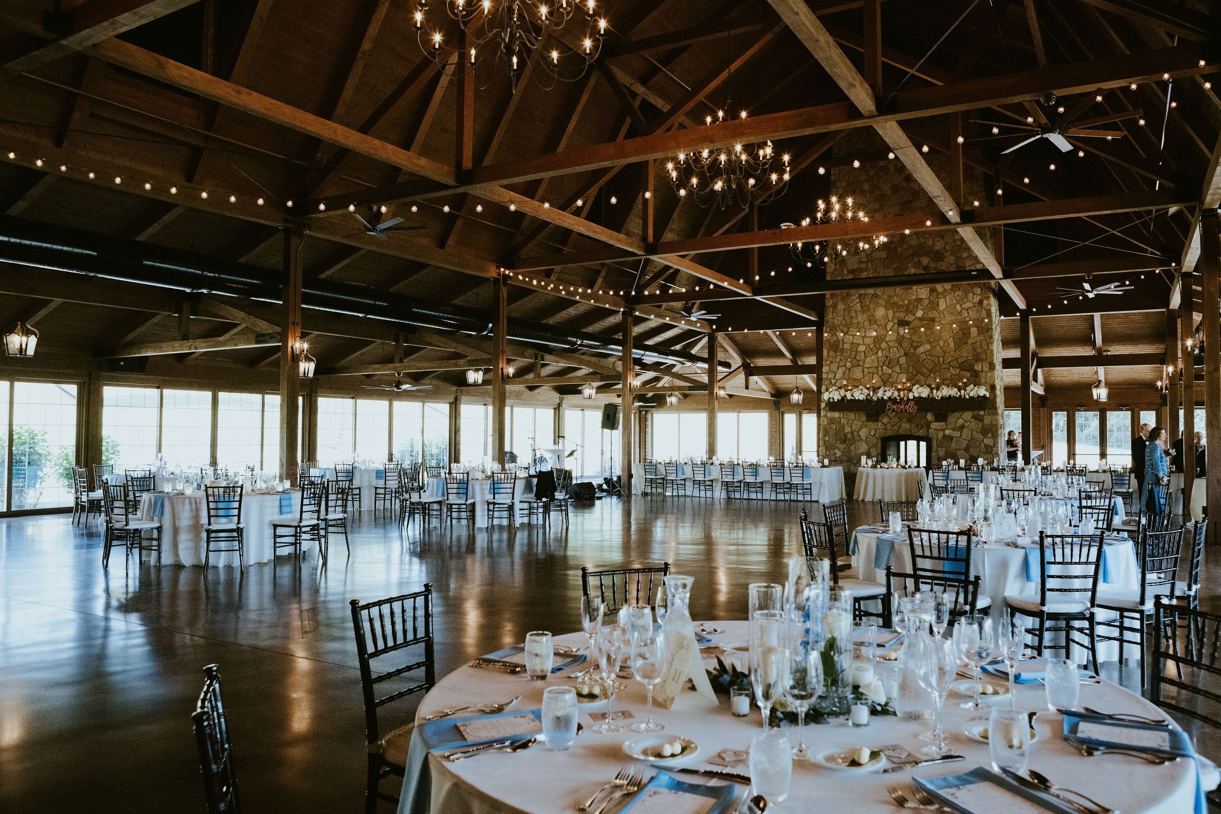 Indoor wedding reception table at Orchard Ridge Farms wedding