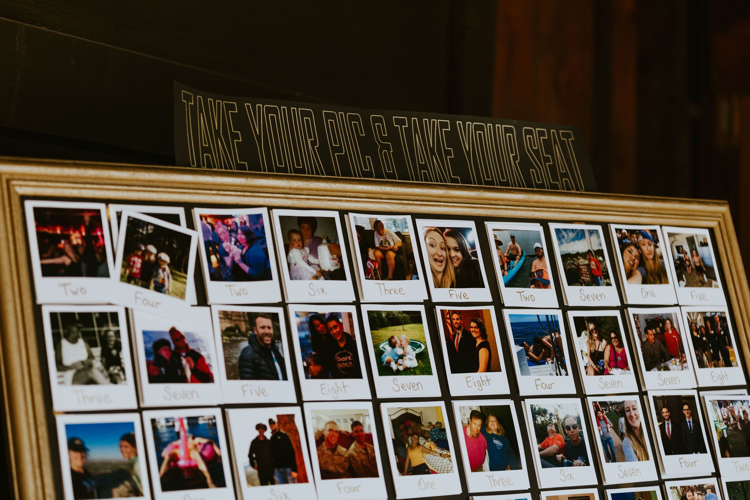 Polaroid photo wall display at fall wedding in Arizona