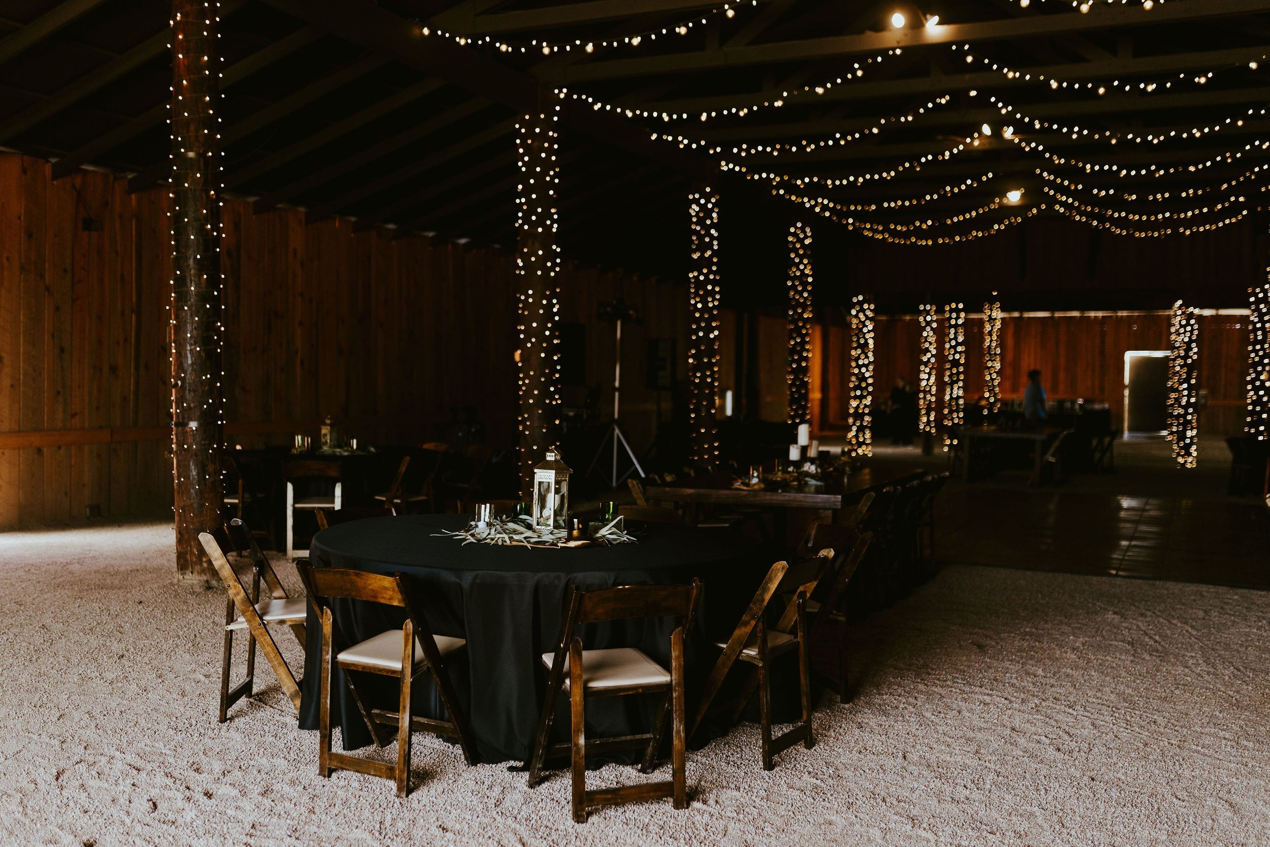 Desert Foothills Events fall wedding reception with black tablecloths