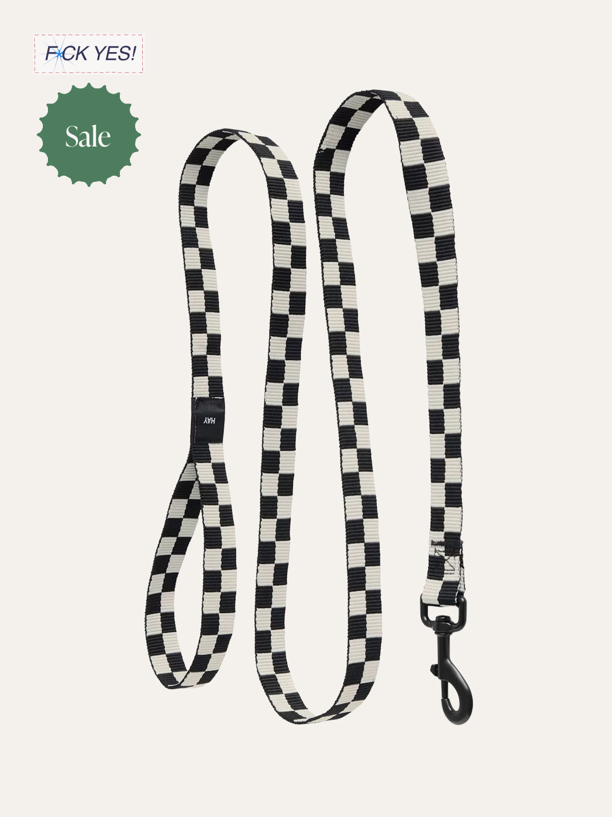 A black and white checkered dog leash with a black metal clip.
