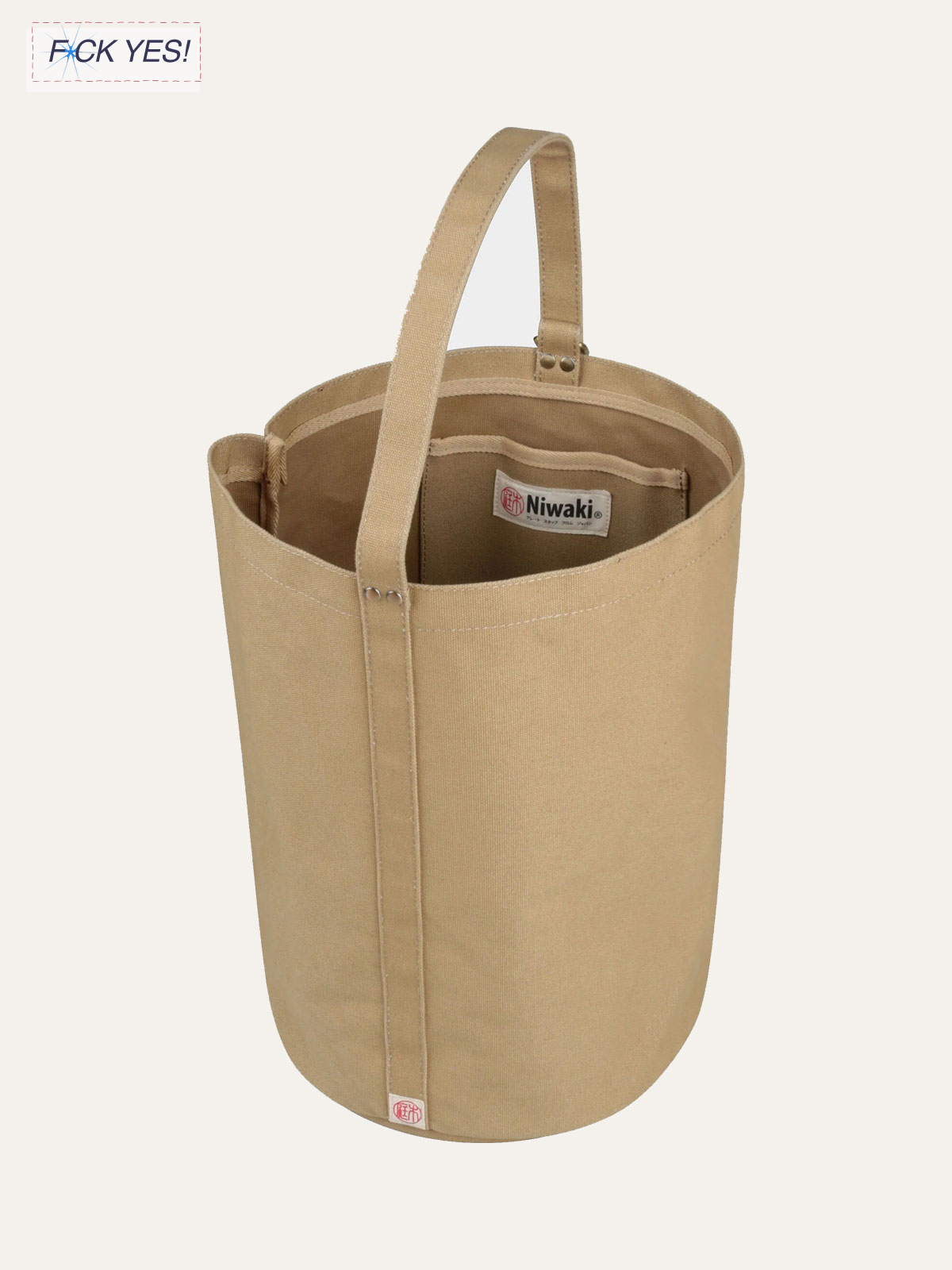 Beige tote bag with handles and an interior pocket, labeled with brand 'Niwaki'.