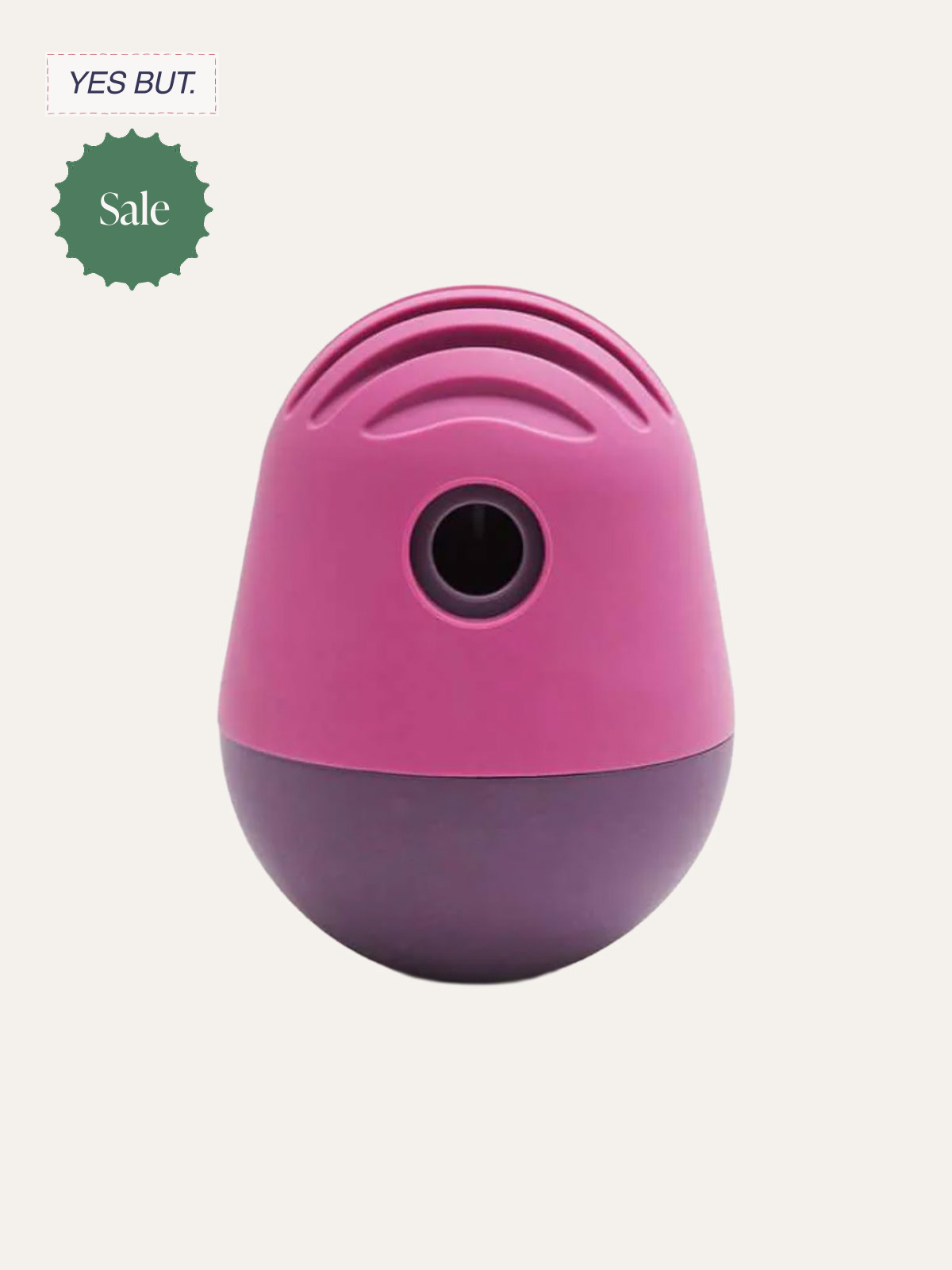 A pink and purple device with a rounded, egg-like shape, featuring a camera or sensor in the center, against a plain background.