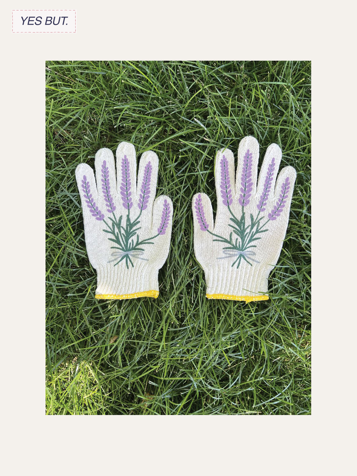 A pair of gardening gloves with a lavender flower design resting on green grass.