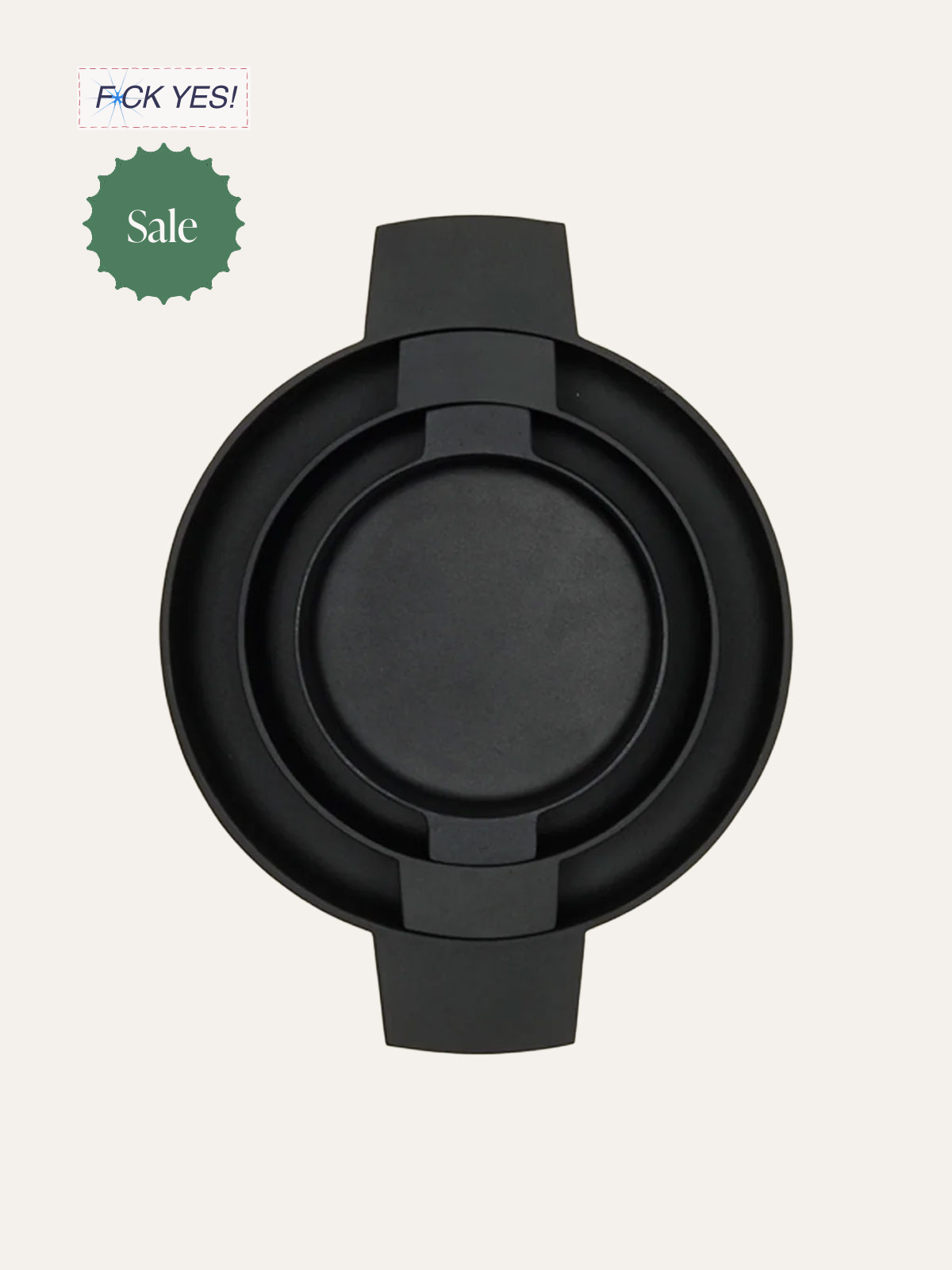 Black smartwatch with blank round display and strap, viewed from above, against light background.