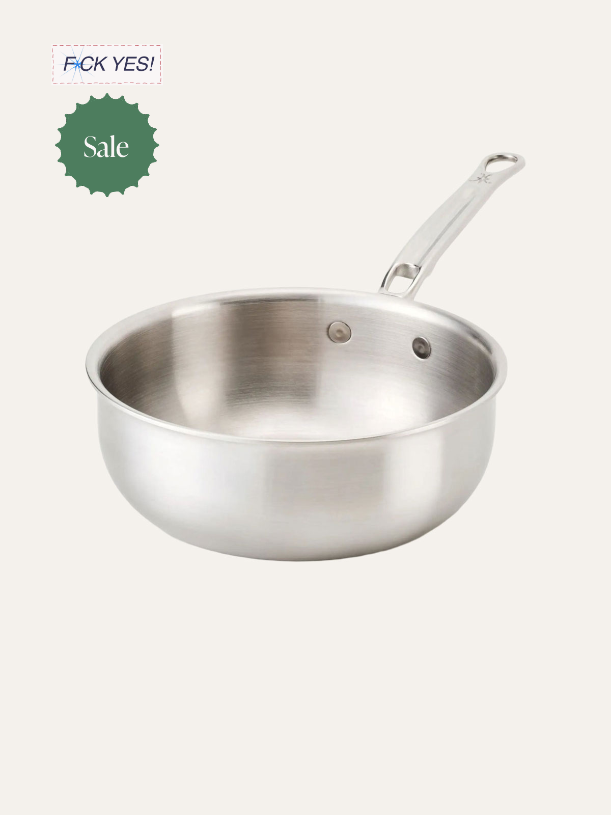 A stainless steel frying pan with a long handle isolated on a white background.