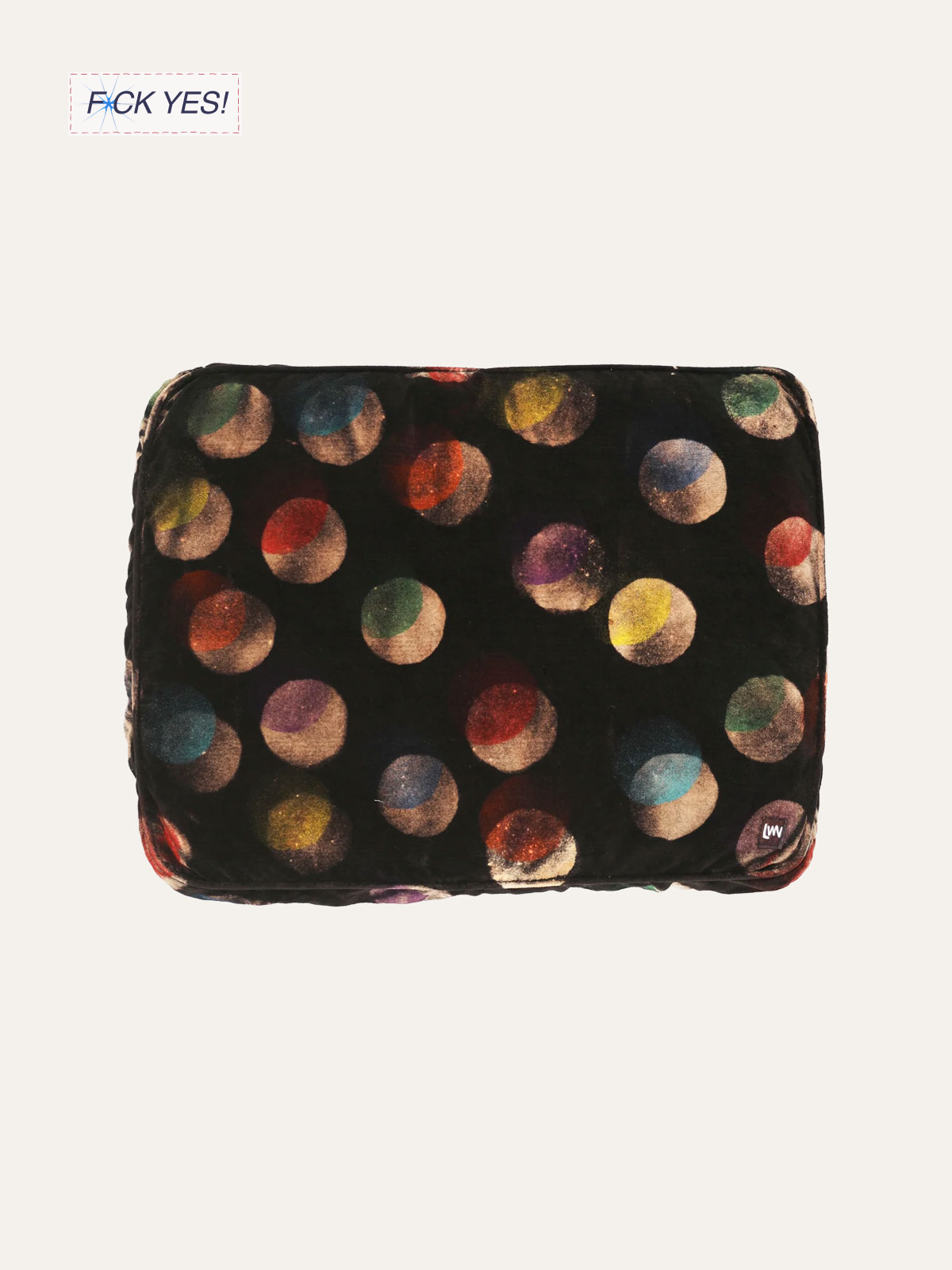 Black quilted bag with multicolored polka dots and a small logo tag in the bottom right corner.