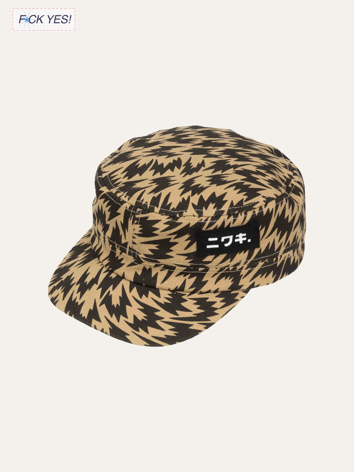 A patterned military-style cap with black and beige zigzag design and a black patch with Japanese characters.