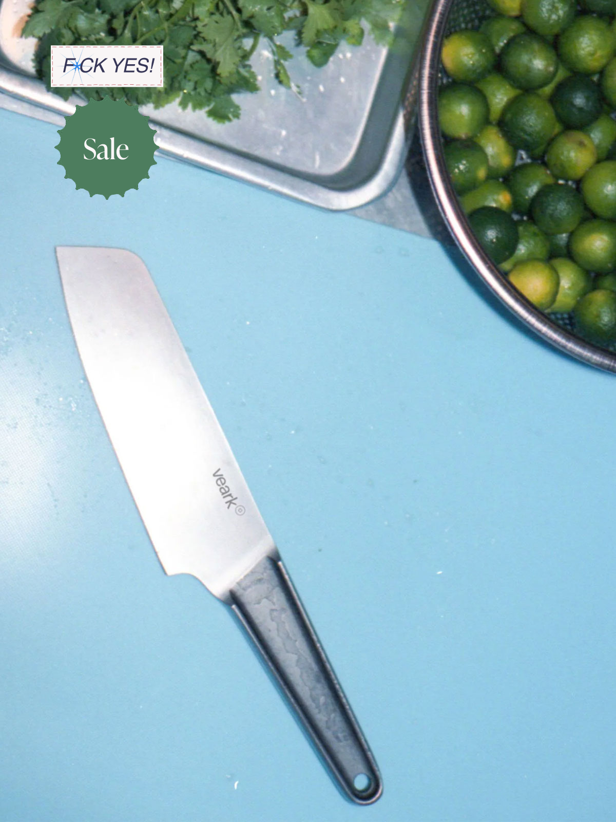 A kitchen countertop with a chef's knife, a bowl of limes, and a tray of cilantro. There are also some stickers on the image that say 'F**K YES!' and 'Sale'.
