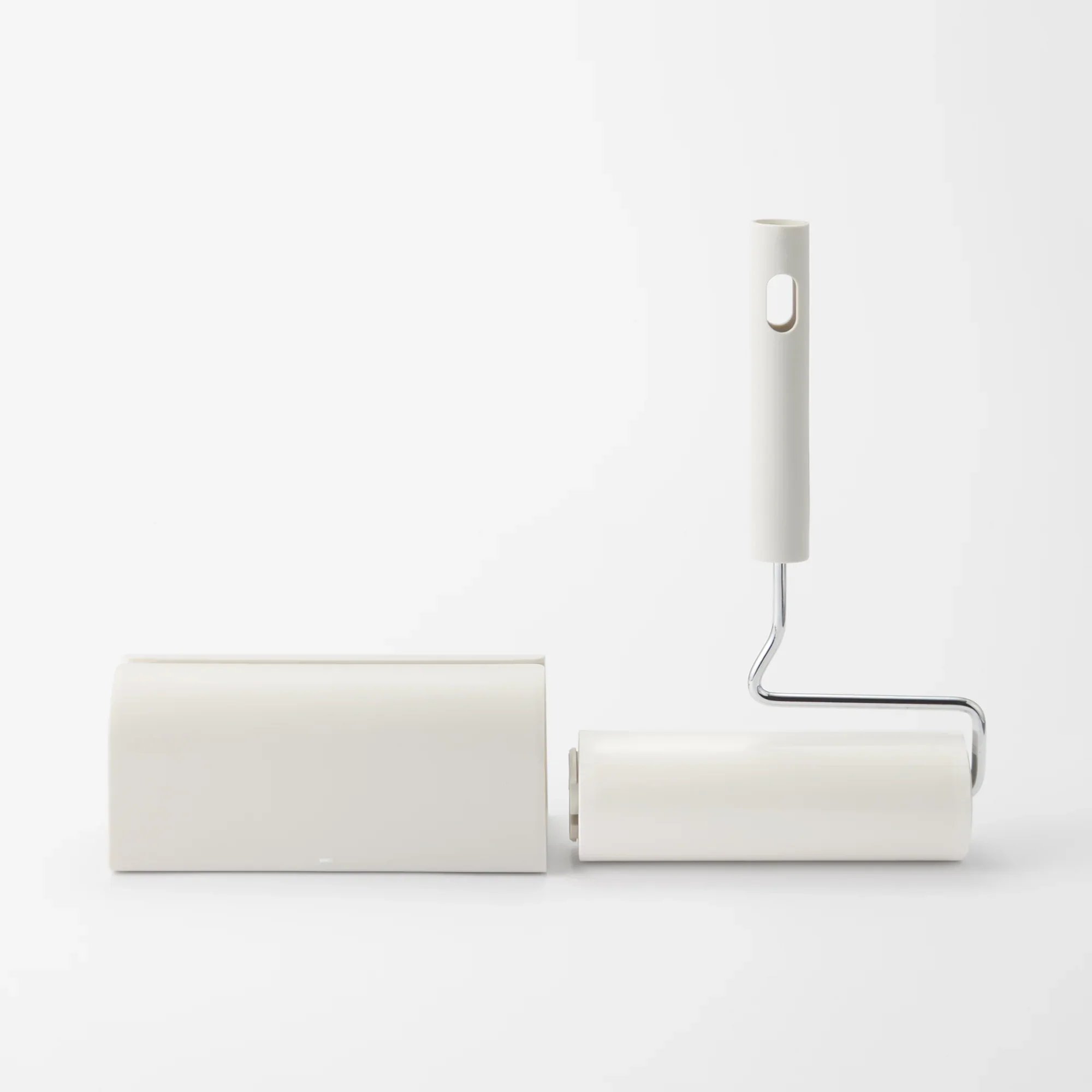 A white medical device with a cylindrical shape and a metallic probe, set against a plain white background.