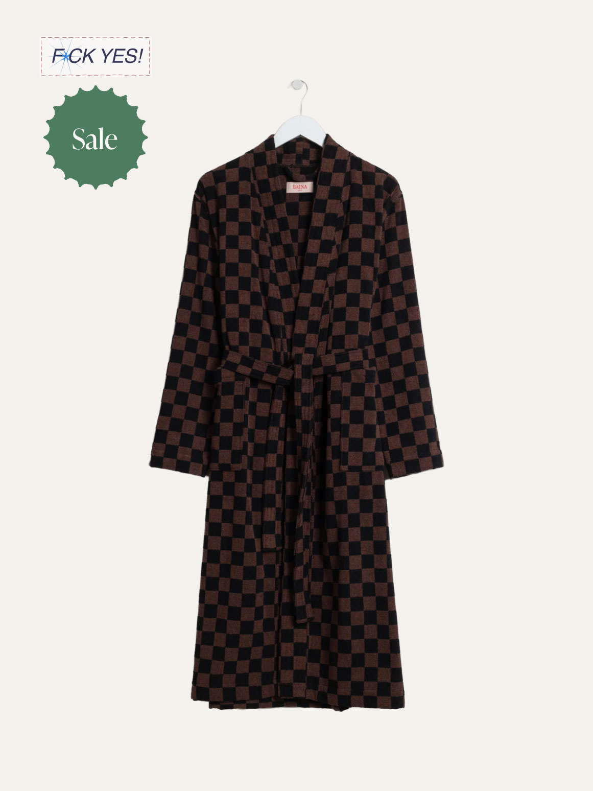 A brown and black checkered long coat with a waist tie, hanging on a white hanger
