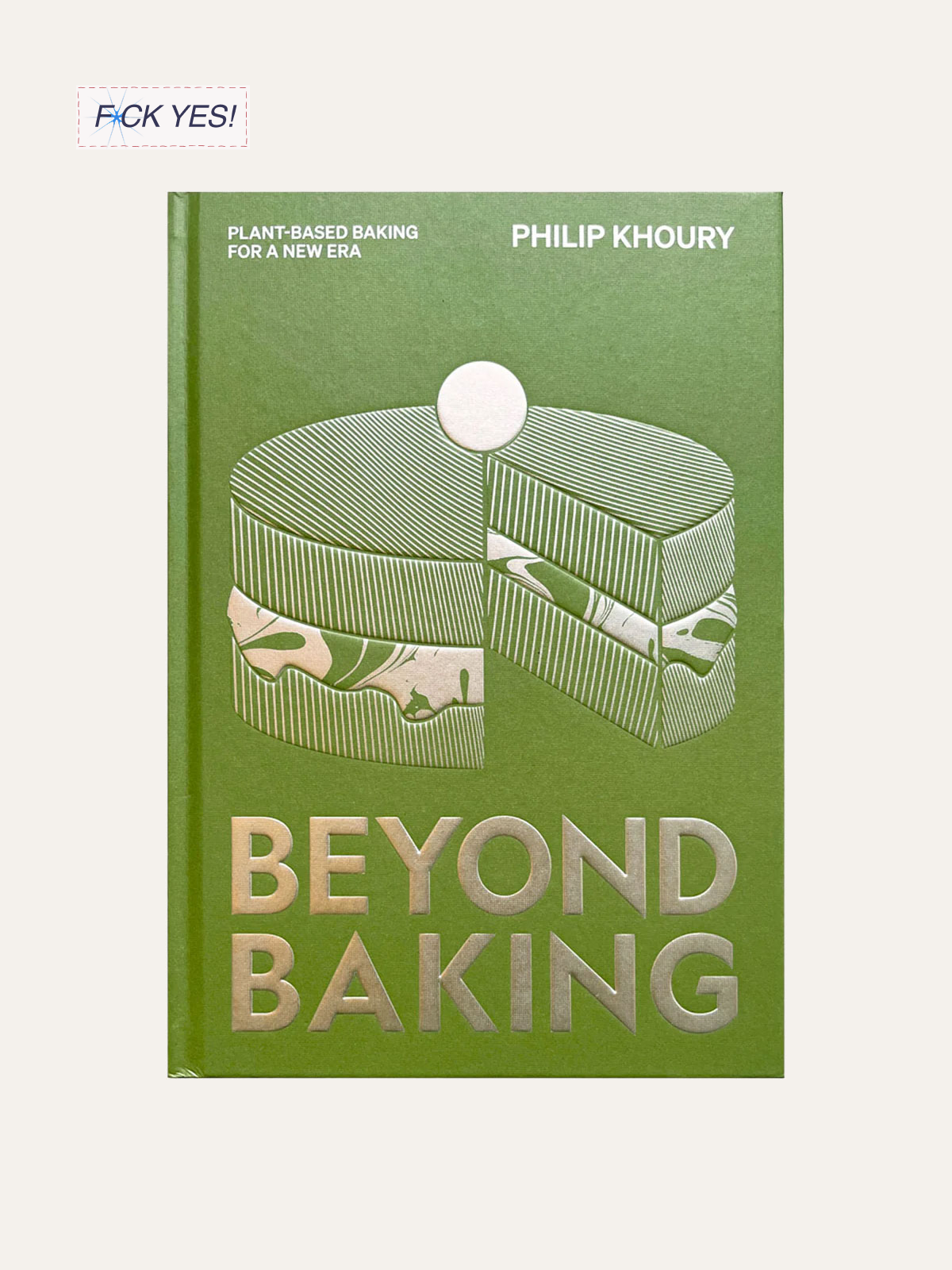 Book titled 'Beyond Baking' by Philip Khoury with a green cover featuring a pie chart illustration and the text 'Plant-based baking for a new era'. A sticker with 'F*ck Yes!' is in the top left corner.