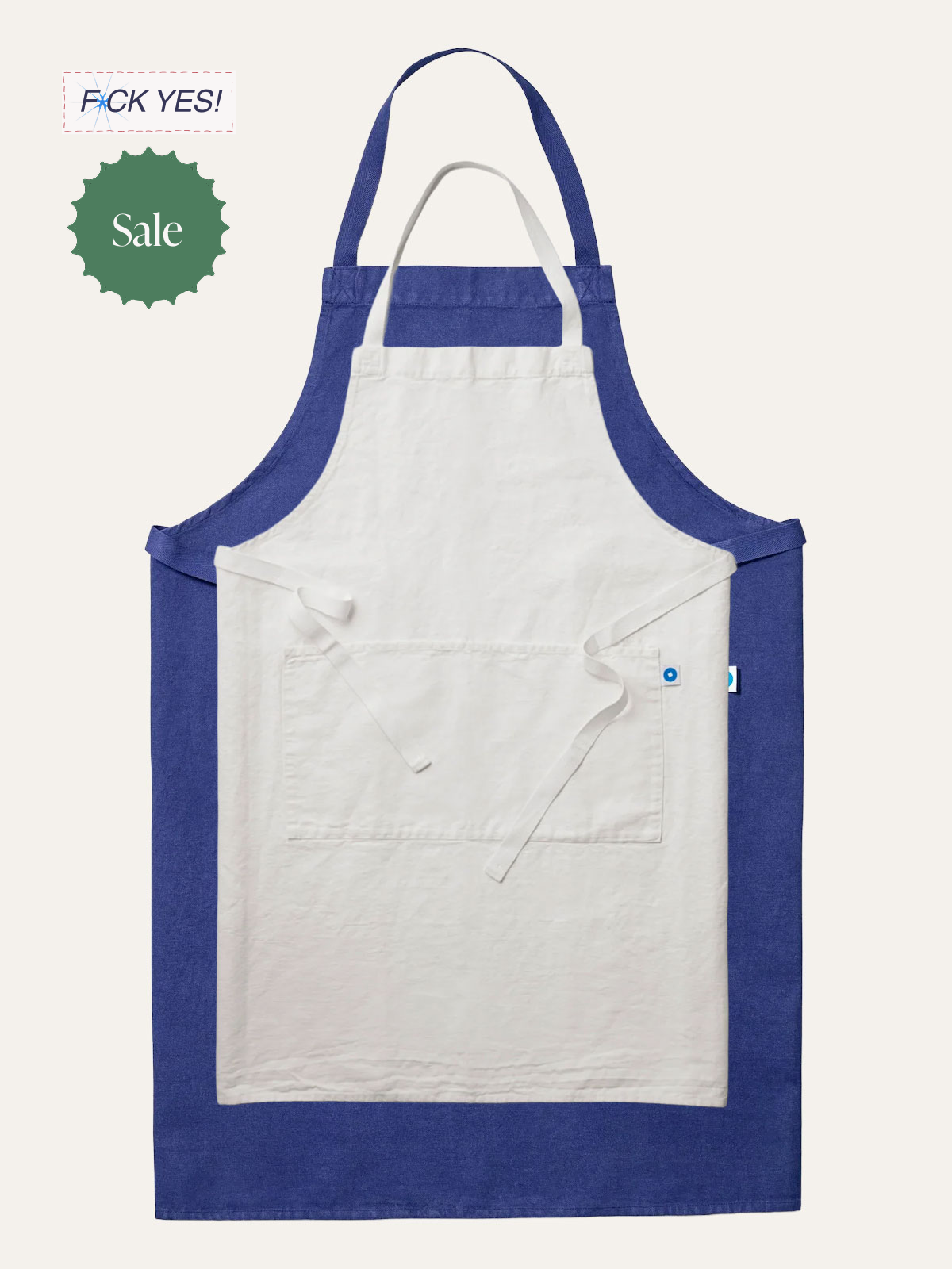 A blue and white apron with a front pocket, tied with straps, with sale and discount stickers in the image.