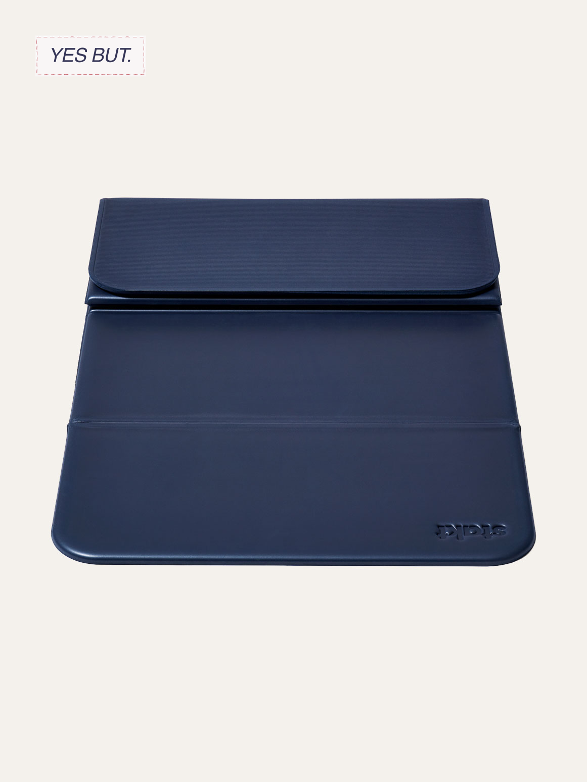 Blue gymnastic or exercise incline mat with a raised headrest and the brand name "Stiga" embossed on the bottom right corner.
