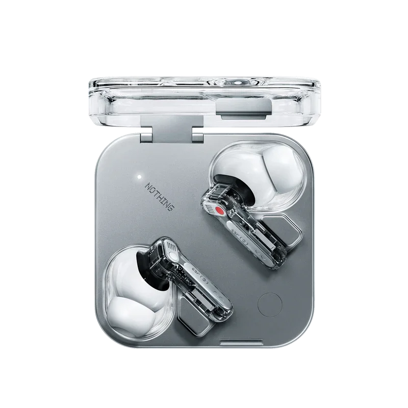 Wireless earbuds in a charging case, with earbuds outside the case on a sleek surface.