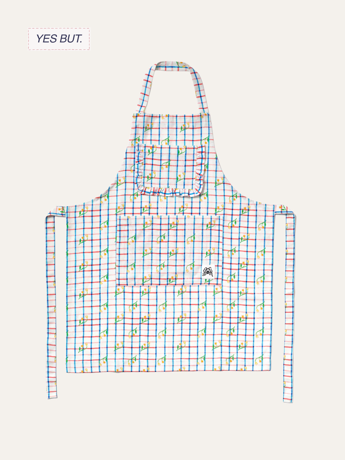 A colorful apron with a red, blue, and white grid pattern decorated with small yellow flowers and green leaves, featuring a front pocket with ruffled edges.