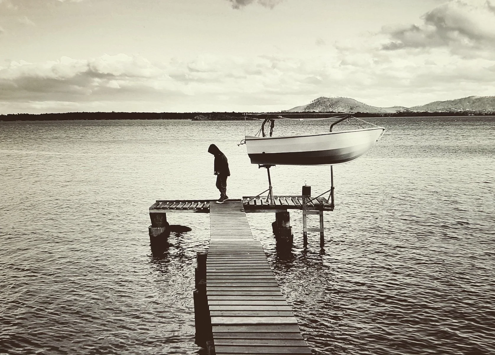 Merit - 7---Ed-Stewart---Mystery-boy-on-the-jetty