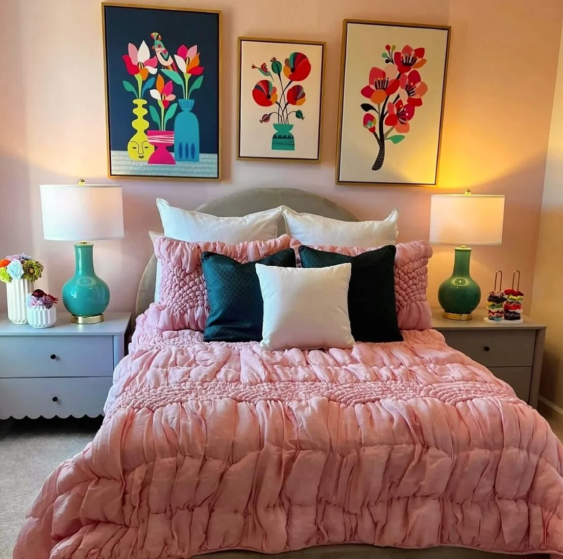 Bedroom with layered bedding and warm lighting