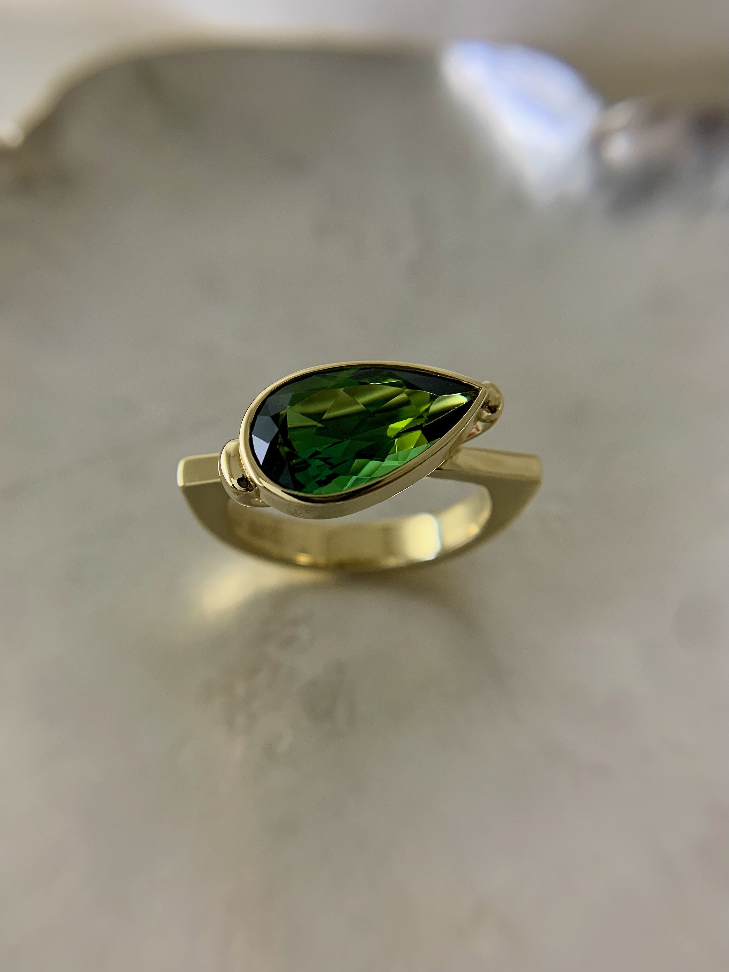 pear shape green tourmaline ring 18ct yellow gold contemporary design