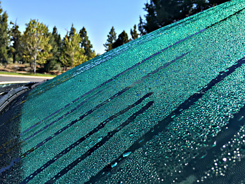 IGL Coatings Glass Ceramic Coating; protecting windows, making them easier to clean, very hydrophobic