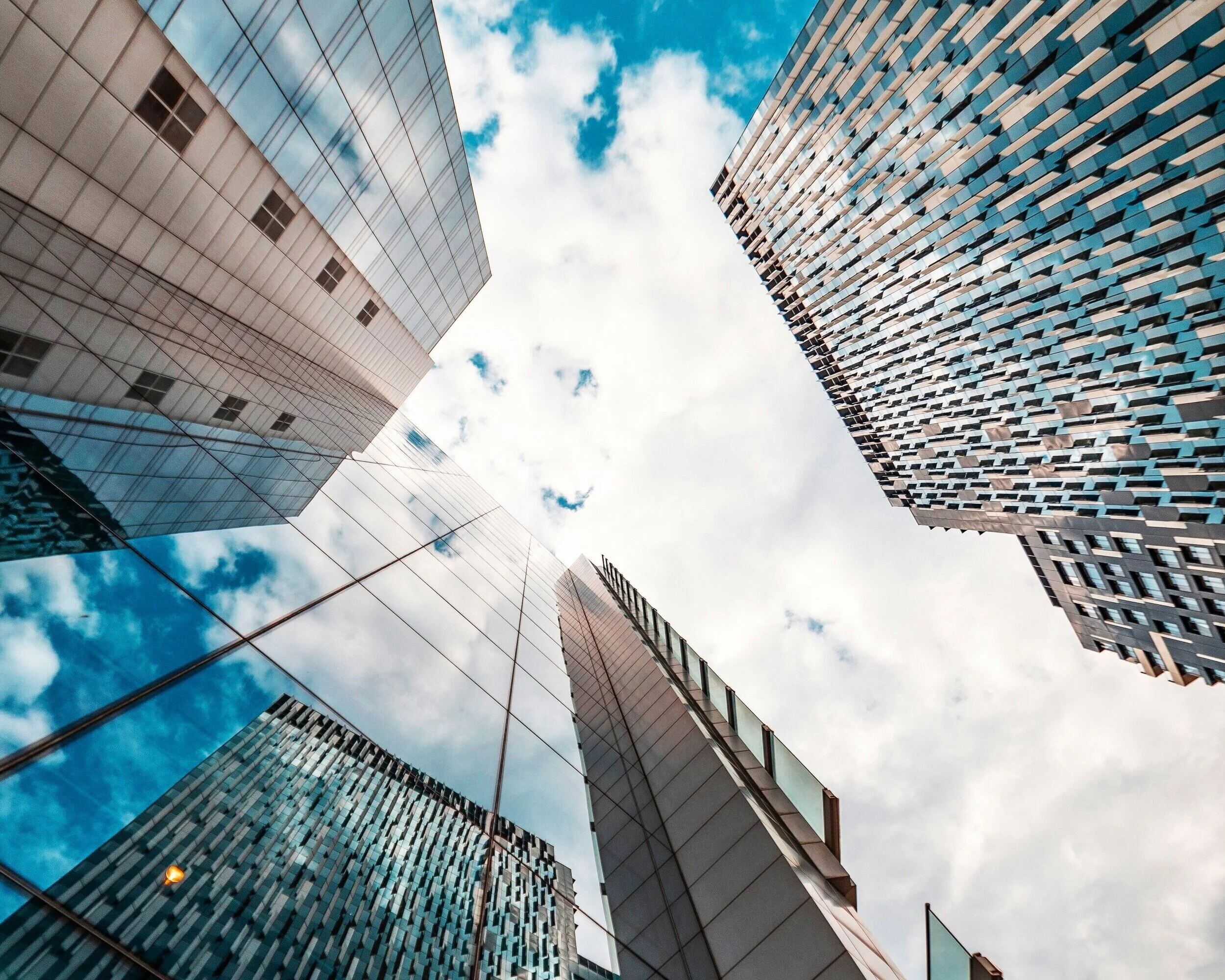 low-angle-photography-of-glass-buildings-2529179.jpg