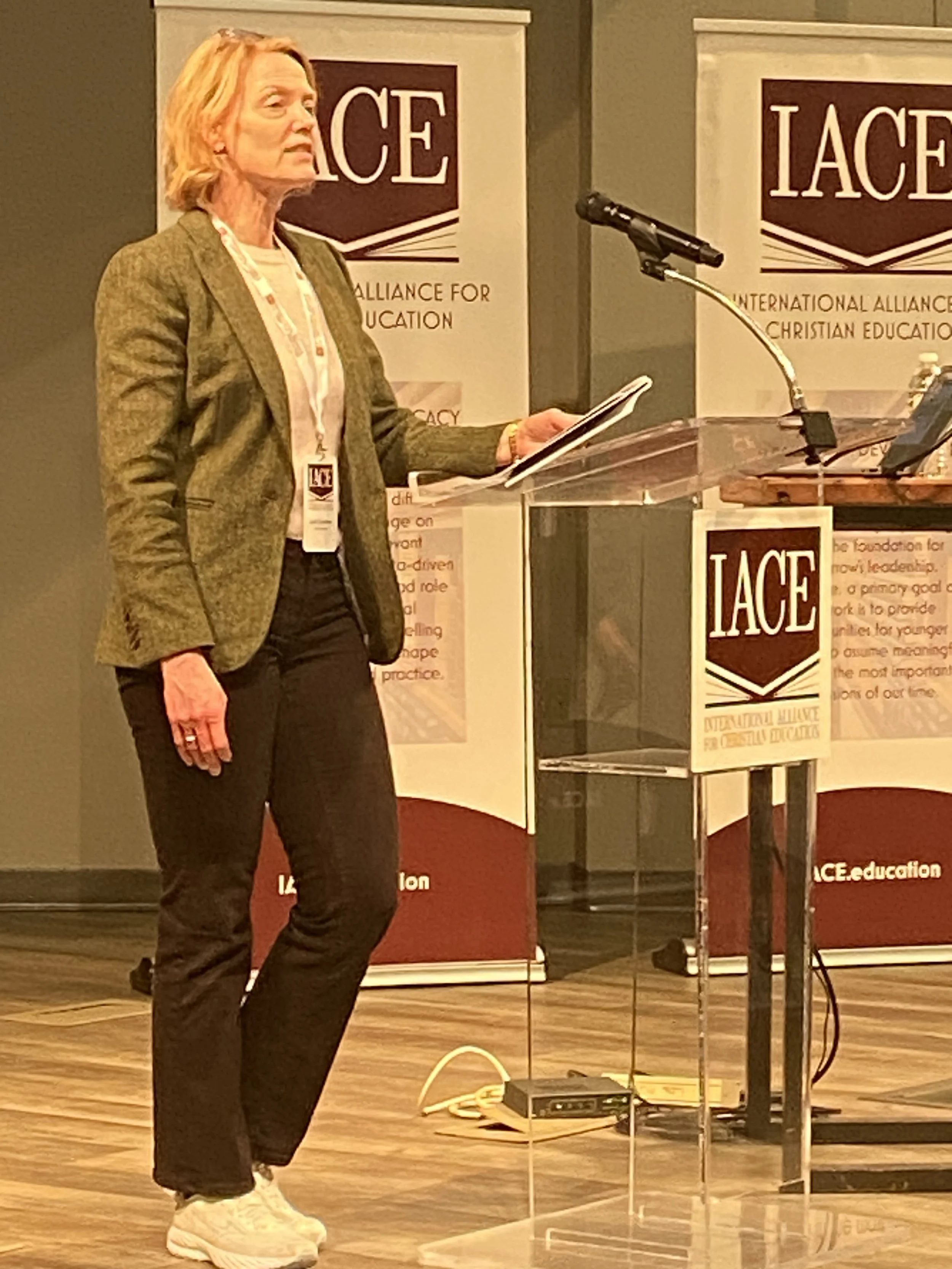  Leah Zuidema of Dordt University led the attendees in the recitation of the Nicene Creed at the start of the conference. 