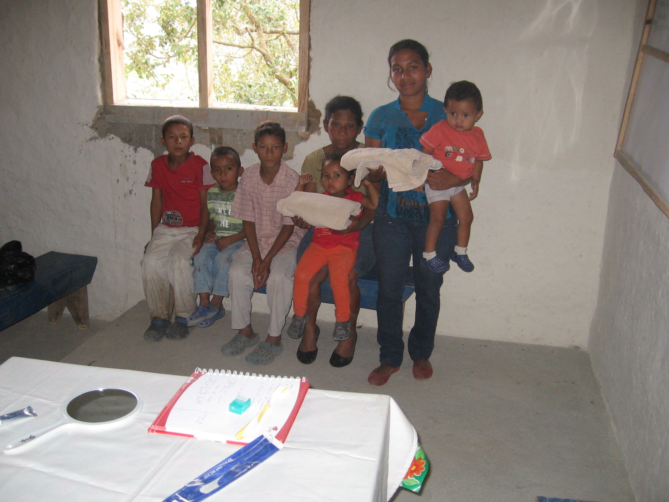 A Carrizalito family with new towels, toothbrushes and toothpaste.