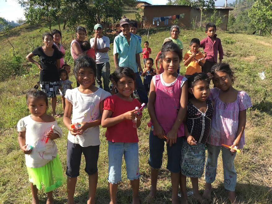 Girls in the village of Los Oreros after receiving their first ever toothbrushes. Most had just brushed their teeth for the first time.