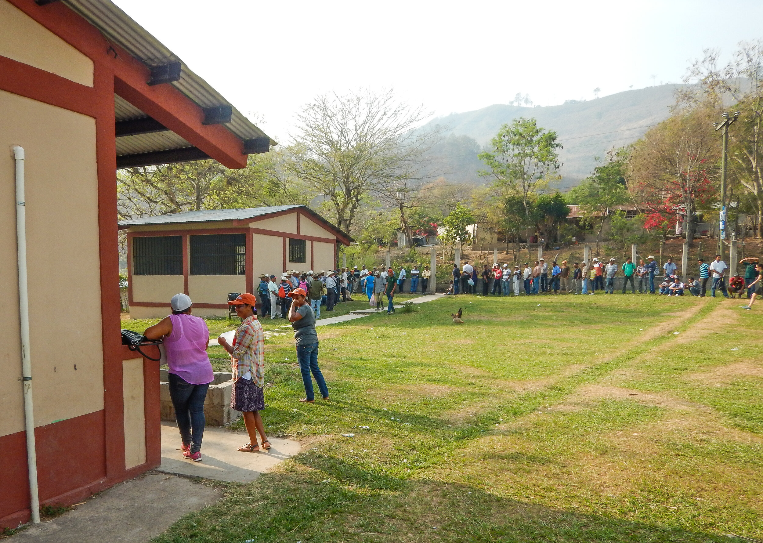 Men line up for cancer-screening.