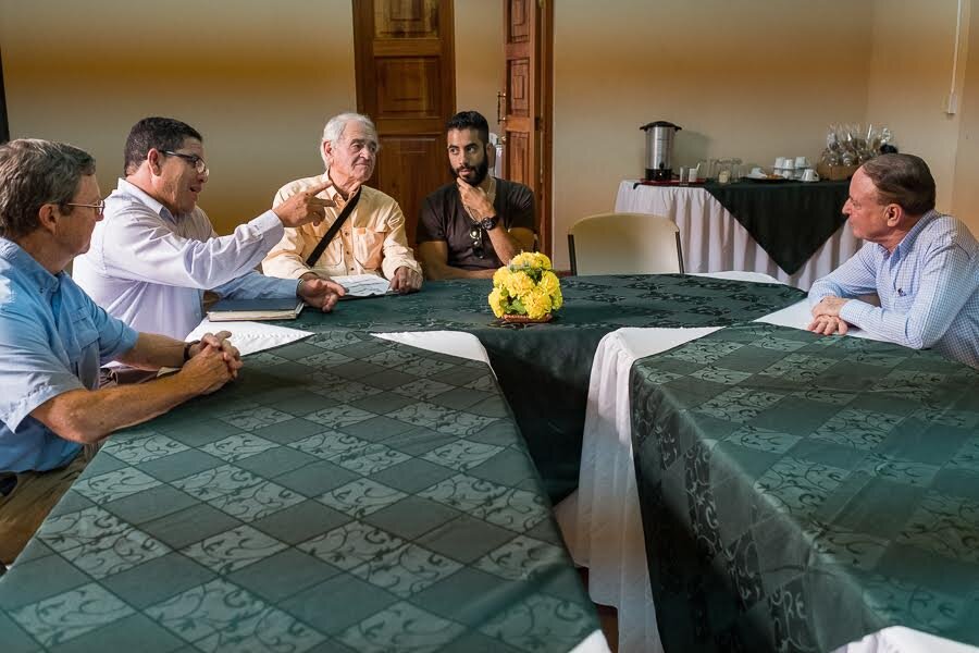 ACTS volunteers Dean Seibert and Mike Harris meet with the mayor in Comayagua.