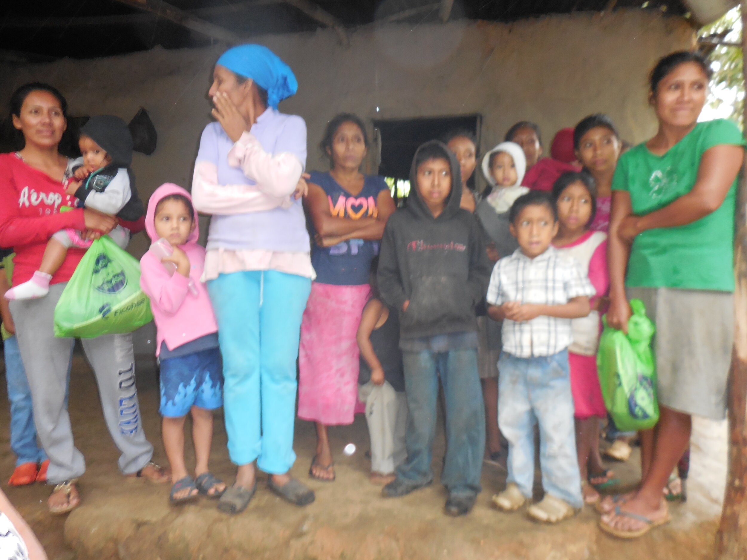This group of women and children in an indigenous village have few latrines and poor access to family planning — connecting them to ACTS services is a priority.